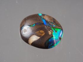 A polished opal matrix, 8mm x 10mm approx
