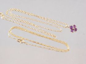 An amethyst flower-shaped pendant, on 9ct gold fine link chain, 3.3g, and a 14ct gold fine link
