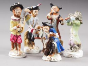 Five Continental porcelain monkey musician figures, the tallest 4 1/2" high (some damages and