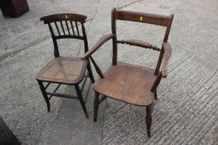 A Windsor bar back elbow chair and a cane seat bedroom chair
