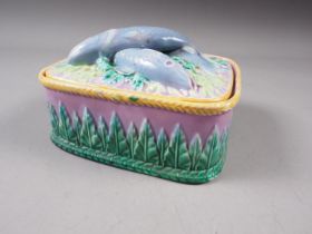 A George Jones Majolica sardine dish and cover, 6" wide (cover restored)