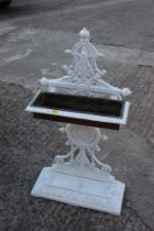 A Victorian white painted cast iron umbrella/stick stand with copper planter, 33" high