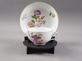 A 19th century Meissen cabinet cup and saucer with floral sprays, cup 3 1/4" dia