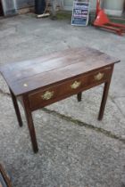 A Georgian provincial side table, fitted one drawer, on champhered supports, 36" wide x 18" deep x