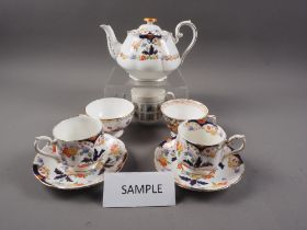 Four Royal Crown Derby cups and saucers, two plates, a Royal Albert "Bodnor" pattern part teaset and