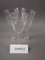 A set of fourteen Dartington "Sharon" wine glasses