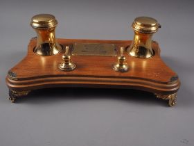 A mahogany and silver gilt mounted ink stand with Vodafone presentation plaque