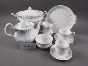 A Royal Albert "Memory Lane" combination service for six, including tureens, tea and coffee pots,