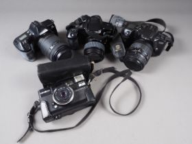A Minolta Dynax 500SI SLR, five other Minolta Dynax cameras and accessories, and other cameras and