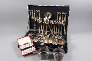 An assortment of gold plated cutlery and other plate