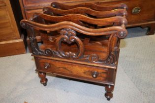 A William IV carved rosewood Canterbury, fitted one drawer, on turned supports, 20" wide x 18"