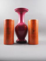 A Chinese porcelain crimson glazed vase with flared rim, seal mark to base, 16 1/2" high, on