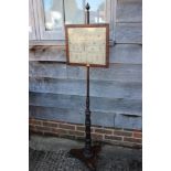 An early 19th century pole screen with rosewood framed sampler panel, worked by Lucy Pridgeon 1809