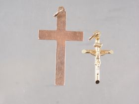 A 9ct gold crucifix and a 9ct gold cross pendant, 5.4g overall