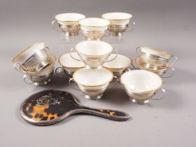 A set of twelve Lenox Porcelain soup cups with two-handled mounts, stamped sterling, 25oz troy