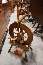 A New Zealand hardwood upright spinning wheel