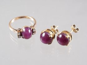 A 14ct gold, diamond and star ruby stone ring, size M/N, 3.8g, and a matching pair of ear studs