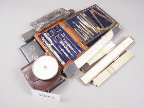 An Otis King's Patent calculator, in leather case, various rules and other scientific instruments