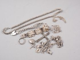 A Victorian silver necklace, a silver heart shaped link bracelet, a bracelet with zodiac sign charms