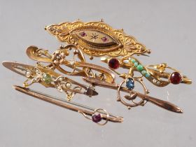 A yellow metal bar brooch, set amethyst, stamped 9ct, another similar brooch, set pearls and