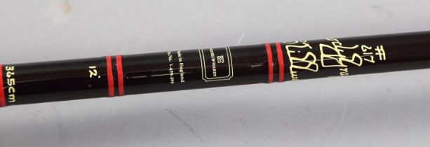 A Hardy graphite Stillwater 12' fly fishing rod and a Hardy Favourite graphite 10' spinning rod