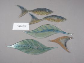 Two studio glass wall displays, three fish and five leaves