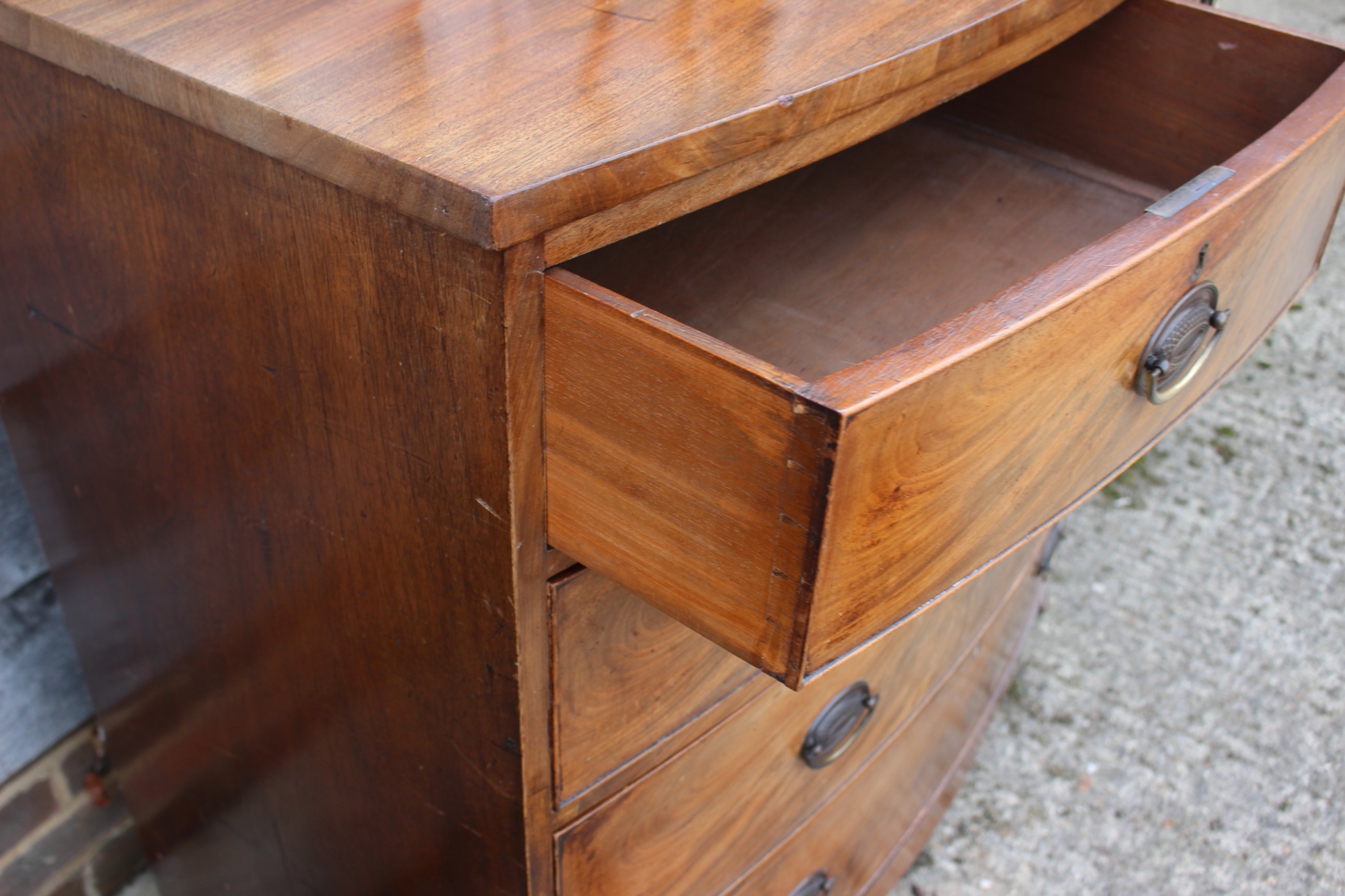 An early 19th century mahogany bowfront chest of two short and three long graduated drawers with - Image 3 of 3