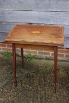 An Edwardian mahogany and satinwood banded fold-over top patience table, on square taper splay