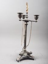 A Roman style bronze three-light candelabrum with fluted column, on three paw supports, 16 1/2"