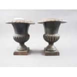 A pair of bronzed Campana vases, on square bases, 9" high, a shaped pewter dish, 14" dia, a pair