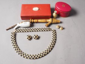 A costume jewellery necklace and matching bracelet, a gilt metal necklace, red and white stones, and