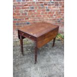 A 19th century mahogany Pembroke table, fitted one drawer, on turned supports, 35 1/2" wide x 21"