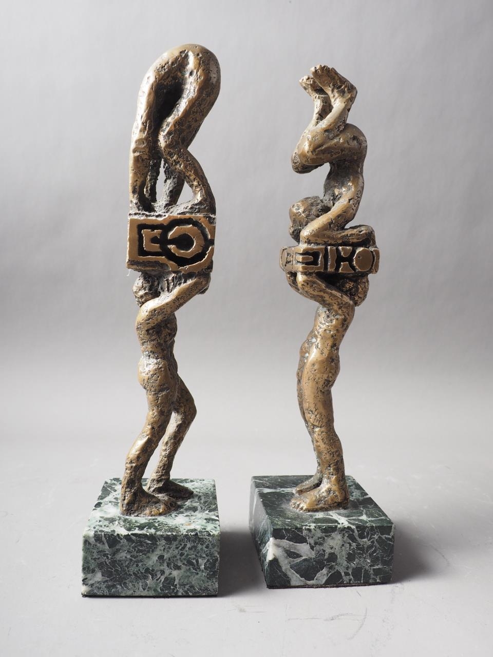 Ernest Bottomley: a pair of bronze "Techno Sculpture" figure groups, on green marble bases, 12 1/ - Image 2 of 2