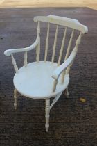A white painted spindle back, a wheelback chair and a mahogany frame stool with needlepoint seat, on