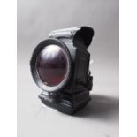 A Powell & Hanmer, "Citadel" oil powered cycle lamp with black painted case and red lens, 4 3/4"