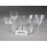 Four Edinburgh Crystal whisky tumblers, five Webb wines, brandy balloons, moulded glass mugs and