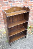 A near pair of 1930s oak four-tier open bookcases, 24" wide x 18" deep x 42" high