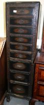 A 1930s Chinese carved hardwood chest of nine drawers, on shaped supports, 16" wide x 12" deep x