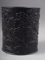 A Chinese Zitan cylindrical brush pot, with carved bird, tree and landscape decoration, 6" dia x 6