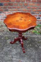 A pair of marquetry shape top occasional tables, on tripod supports, 20" dia x 23" high, and a