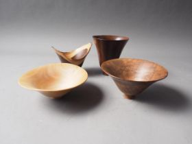Burt Marsh: four turned wooden bowls in line, laburnum, mahogany and walnut (laburnum and mahogany