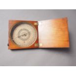 An early 19th century compass, in hardwood box, 5 3/4" wide