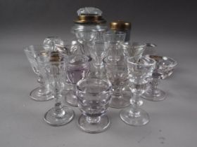 A quantity of 19th century and later penny licks, including liqueurs and ports, and four inkwells,