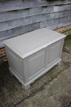A grey painted pine panel front blanket box, on bracket feet, 38" wide x 22" deep x 26 1/2" high