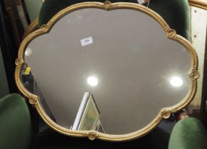 A gilt metal framed wall mirror
