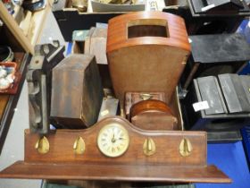 Three slate mantel clock cases, tallest 12 1/2" high, and a quantity of other clock cases, various