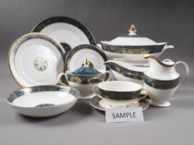 A Royal Doulton "Carlisle" pattern bone china dinner service for eight, including tureens, gravy
