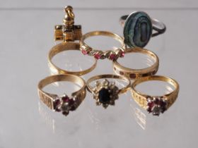 Five 9ct gold dress rings, 11.65g, an 18ct gold, ruby and diamond dress ring, 4.1g, a silver gilt