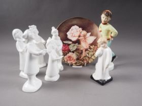 Five Royal Doulton Christmas Choir Singer figurines, with original boxes, a Royal Doulton figure, "