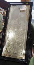 An ebonised framed wall mirror, decorated Art Nouveau "Summer", 35" x 16" overall
